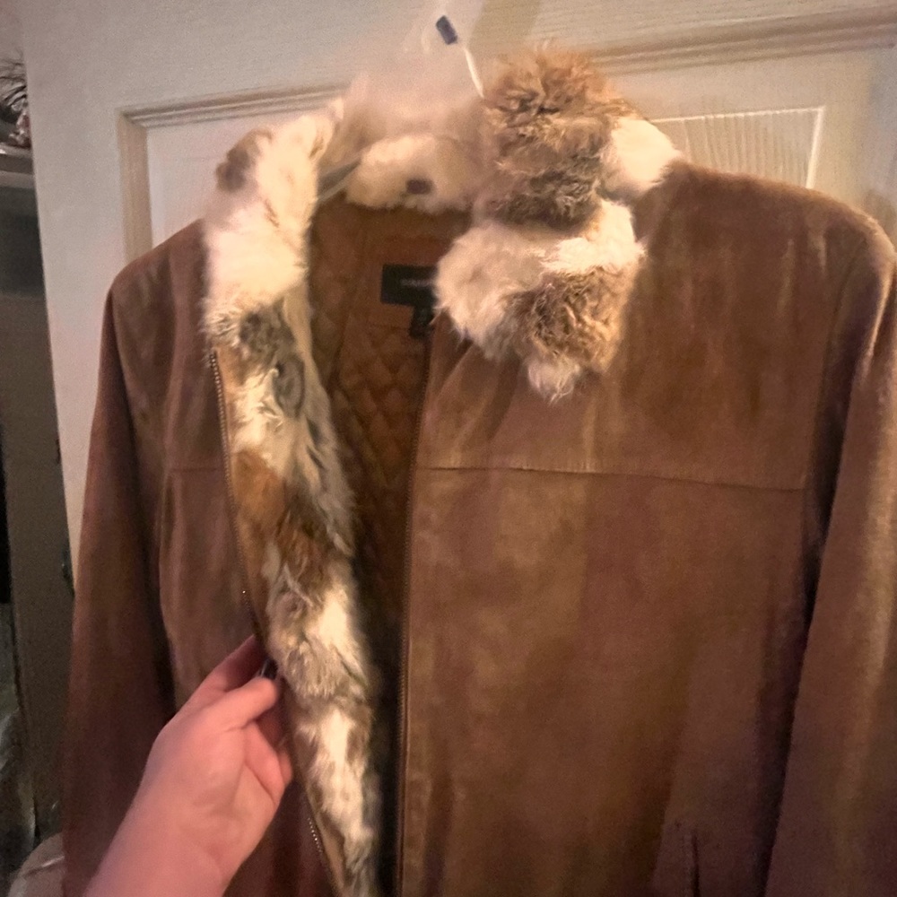 BNWT real leather and rabbit fur jacket Size XL in great condition for used.